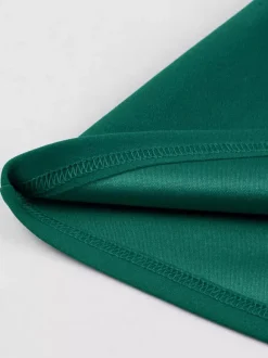 Robe trapèze rétro froncée à col en V et revers contrastés pour femme 2026