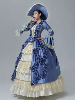 Robe victorienne vintage manches en dentelle volants froncés longueur au sol.