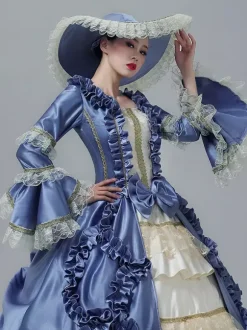 Robe victorienne vintage manches en dentelle volants froncés longueur au sol.