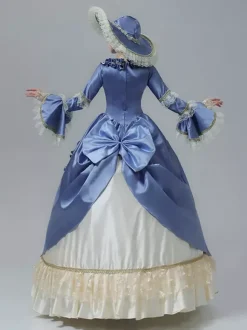 Robe victorienne vintage manches en dentelle volants froncés longueur au sol.