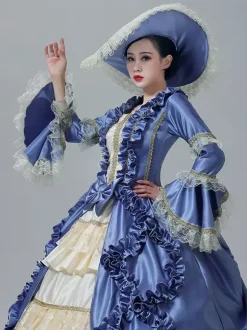 Robe victorienne vintage manches en dentelle volants froncés longueur au sol.