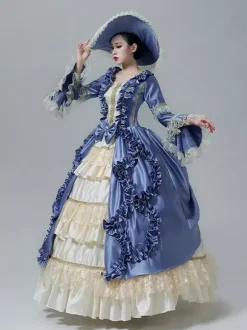 Robe victorienne vintage manches en dentelle volants froncés longueur au sol.
