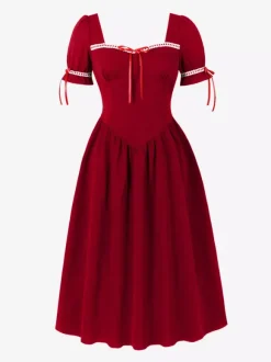 Robe vintage pour femme manches bouffantes coupe midi col carré n艙ud sur le devant évasée.