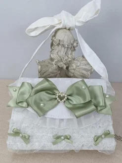 Sac à main ROCOCO Style Lolita camée rose chaînes en cuir PU volants arc sac à main accessoires Lolita