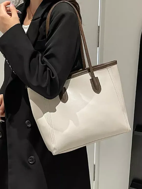 Sac cabas minimaliste en cuir à blocs de couleur grande capacité idéal pour les trajets quotidiens. Sac à bandoulière.