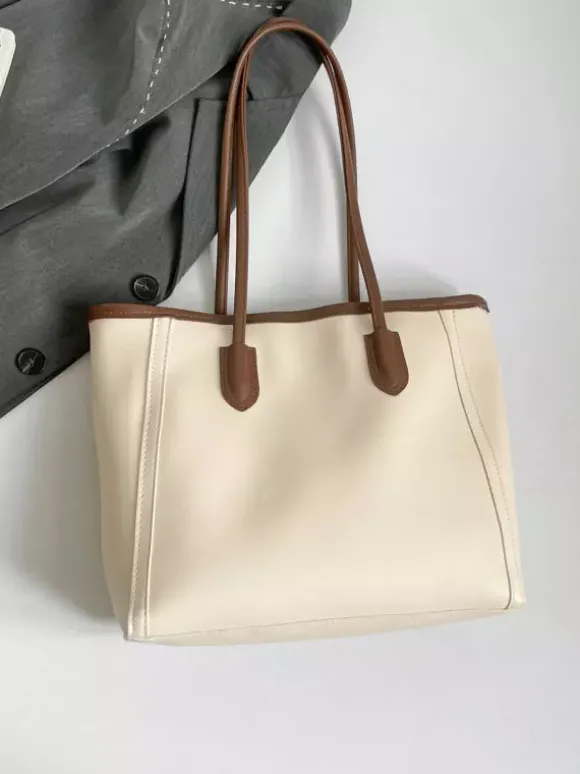 Sac cabas minimaliste en cuir à blocs de couleur grande capacité idéal pour les trajets quotidiens. Sac à bandoulière.
