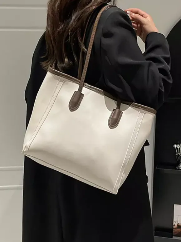 Sac cabas minimaliste en cuir à blocs de couleur grande capacité idéal pour les trajets quotidiens. Sac à bandoulière.