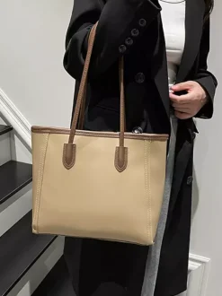 Sac cabas minimaliste en cuir à blocs de couleur grande capacité idéal pour les trajets quotidiens. Sac à bandoulière.