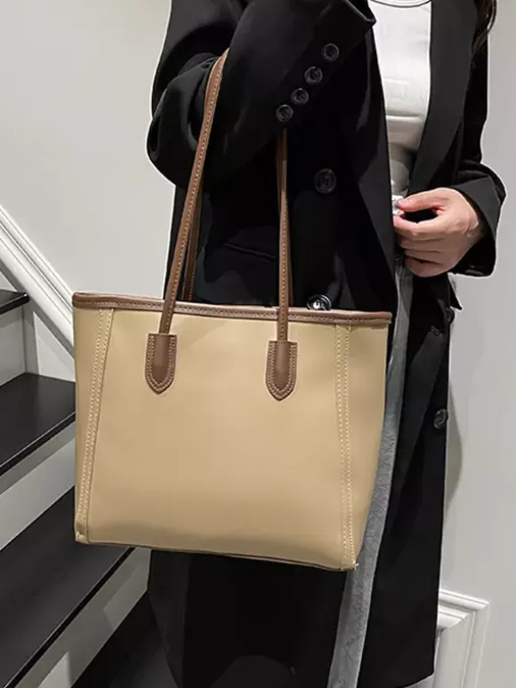 Sac cabas minimaliste en cuir à blocs de couleur grande capacité idéal pour les trajets quotidiens. Sac à bandoulière.