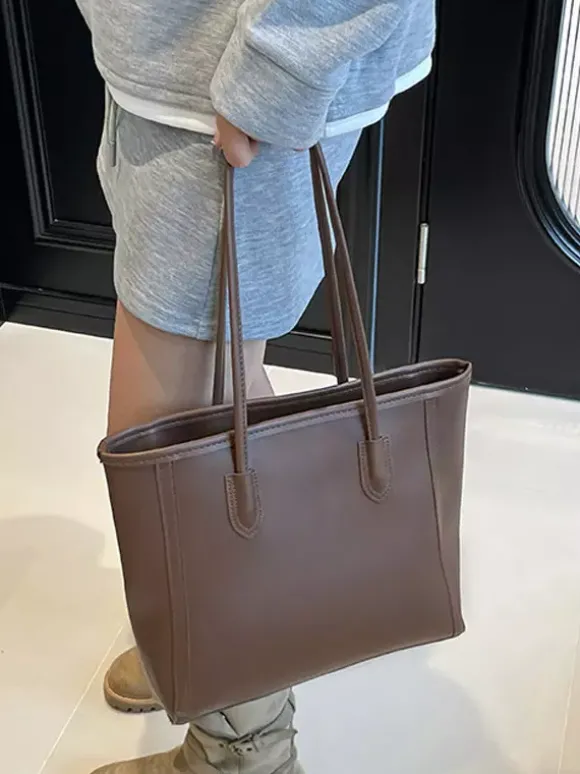 Sac cabas minimaliste en cuir à blocs de couleur grande capacité idéal pour les trajets quotidiens. Sac à bandoulière.