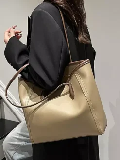 Sac cabas minimaliste en cuir à blocs de couleur grande capacité idéal pour les trajets quotidiens. Sac à bandoulière.
