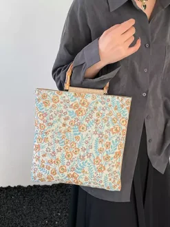 Sac cabas vintage à imprimé floral et anses en bambou grande capacité en toile porté épaule.