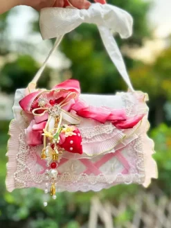 Sac Lolita de style pastoral en polyester rose à volants et chaînes sac à main ombré accessoires Lolita