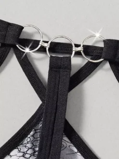 Sous-vêtement string pour homme imprimé serpent taille basse à bretelles.