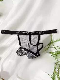 String pour homme en dentelle florale argentée avec poche en maille transparente et sous-vêtement sexy et élastique