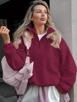 Sweat-shirt doux et duveteux à demi-zip coupe ample poignets côtelés manches longues idéal pour un look décontracté au quotidien.