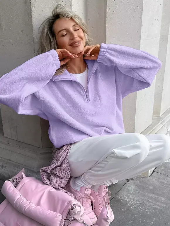 Sweat-shirt doux et duveteux à demi-zip coupe ample poignets côtelés manches longues idéal pour un look décontracté au quotidien.