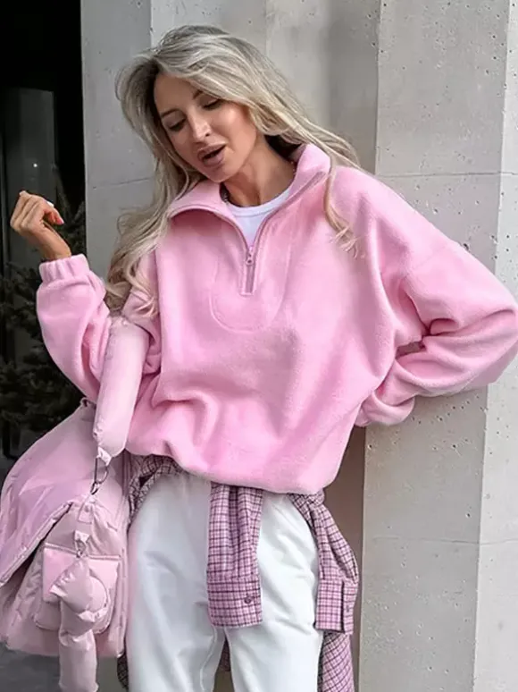 Sweat-shirt doux et duveteux à demi-zip coupe ample poignets côtelés manches longues idéal pour un look décontracté au quotidien.