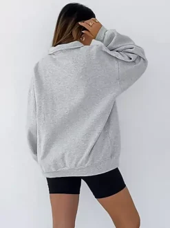 Sweat-shirt polo oversize drapé boutons partiels sur le devant pull basique décontracté