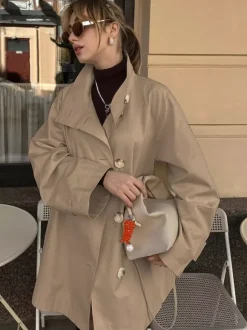 Trench-coat femme en mélange de coton - Coupe oversize minimaliste à double boutonnage et manches larges - Collection printemps-été 2026