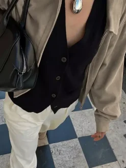 Veste bomber courte décontractée en faux daim pour femme col à revers zippé ourlet côtelé élastique.
