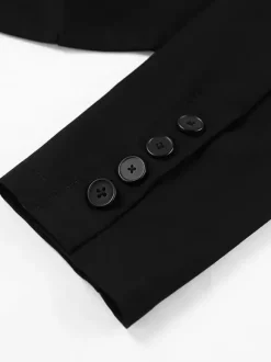 Veste de costume courte à col mandarin poche avant coupe ajustée.